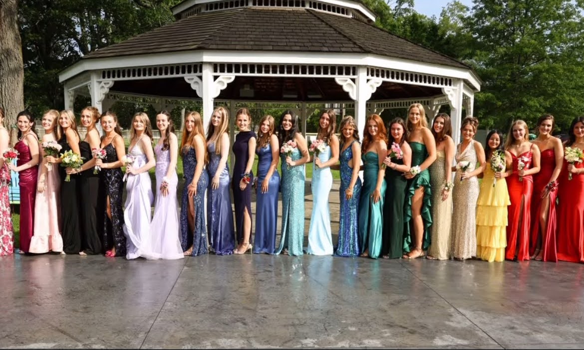 The senior girls gathered together for prom photos at the OS Town Green on May 31, 2025!