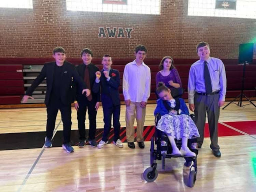 OSHS students smiling at the prom