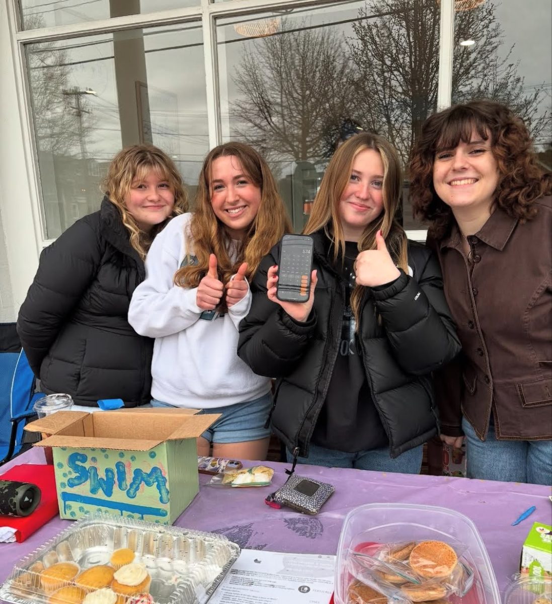 Members of the IPCAA at a fundraiser for their club. 