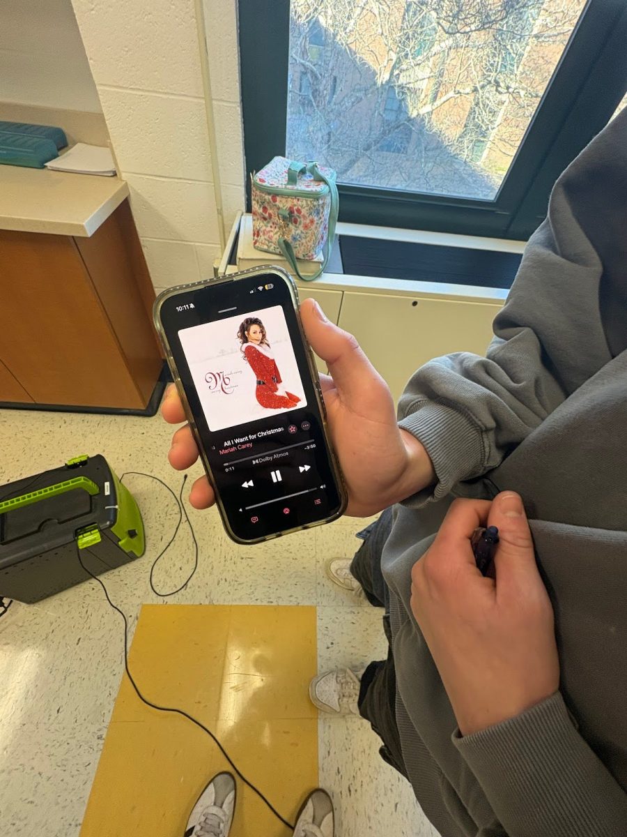  Student Chase Comboni listening to “All I Want for Christmas is You”
