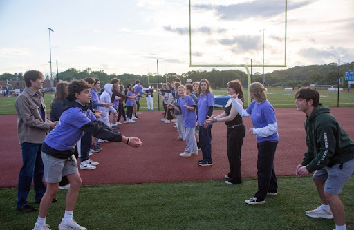 Students Participating in the Water Balloon Toss game at the 2025 Cancer Walk.


