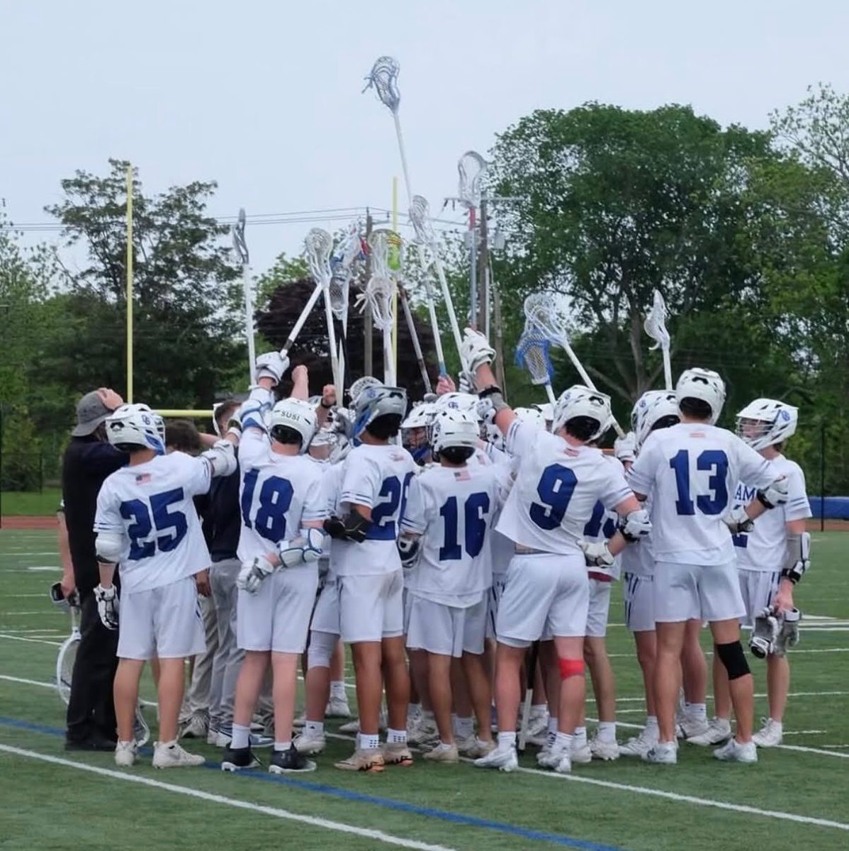 Picture of the 2024-2025 boys lacrosse team before their win against North Branford on May 27th, 2025
