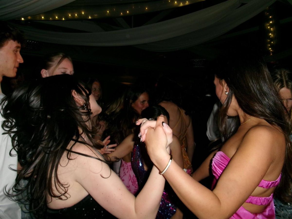 Students dancing on the dance floor at OSHS’s 2026 Prom